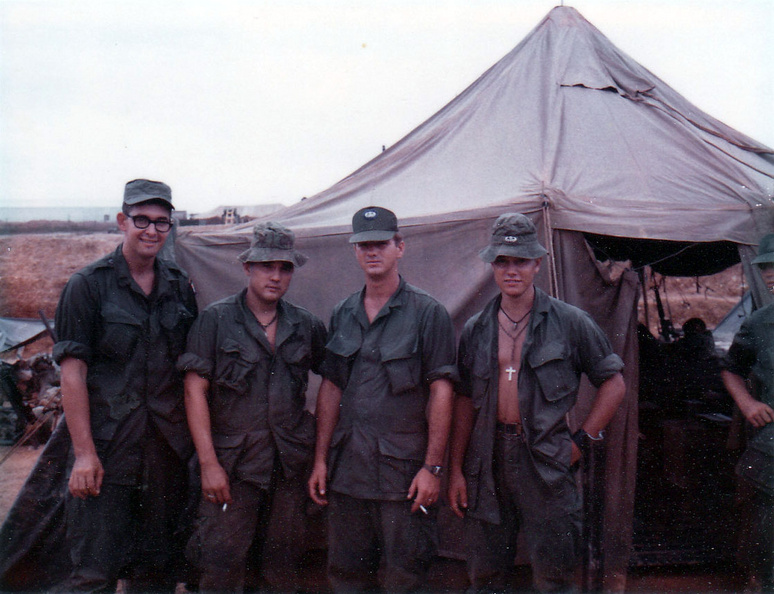 December 1968 - Camp Eagle- from left to right - Platoon leader 1Lt Edwards, next is Sp/4 Rich Brown (Oklahoma), next is squad leader SSgt Lee Bradford (Kentucky), and then me Sp/4 Art Marotto (Buffalo). - December 1968 - Camp Eagle- from left to right - Platoon leader 1Lt Edwards, next is Sp/4 Rich Brown (Oklahoma), next is squad leader SSgt Lee Bradford (Kentucky), and then me Sp/4 Art Marotto (Buffalo). ArtMarotto_02_CEagle69.jpg